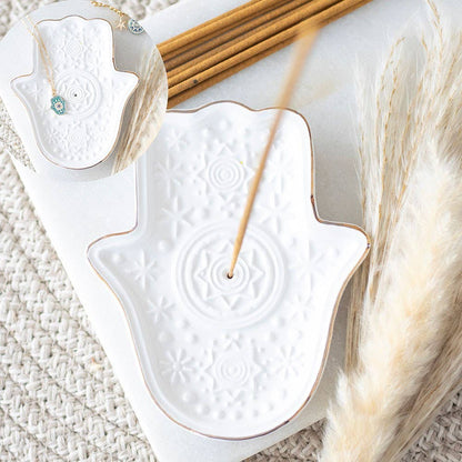Weißer Räucherstäbchenhalter und Schmuckschale mit Hamsa-Motiv