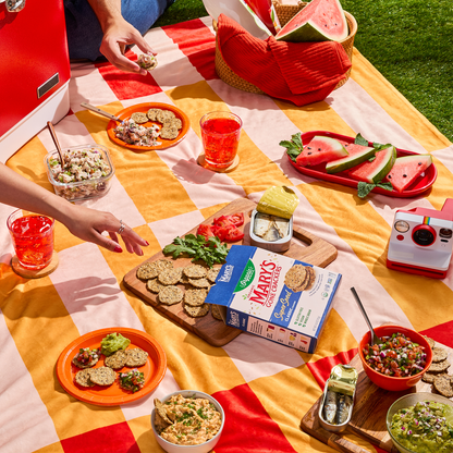 Mary's Gone Crackers Organic Super Seed Crackers - Classic served with food on a sharing table